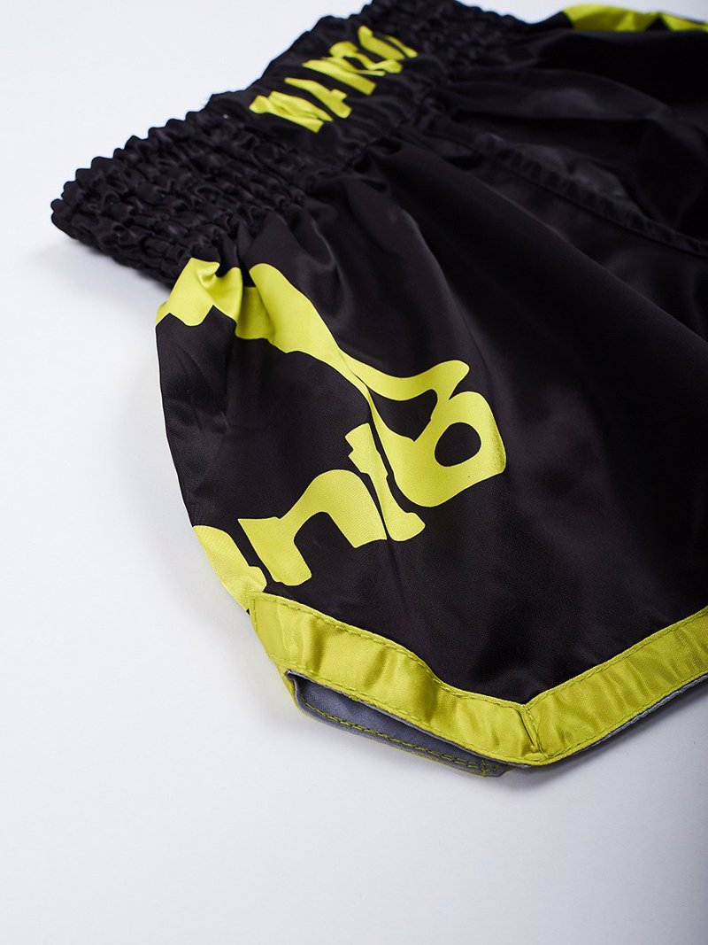 MANTO MUAY THAI SHORTS DUAL black/yellow