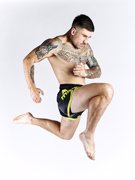 MANTO MUAY THAI SHORTS DUAL black/yellow